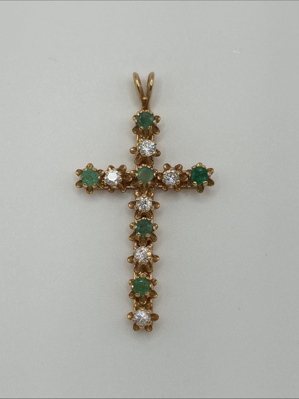 Gold tone costume Cross Pendant with Green and White Gemstones